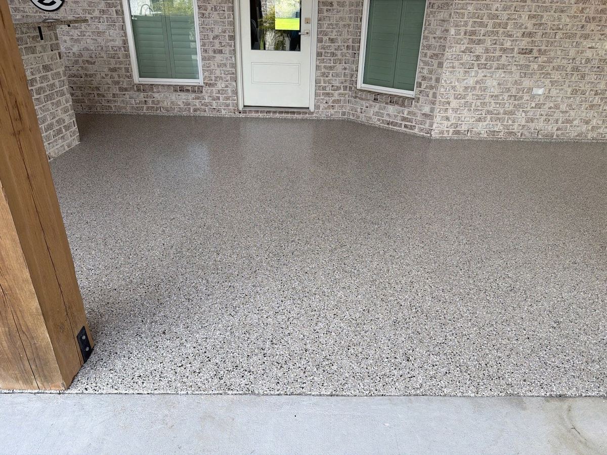 Covered brick patio with tan flake coating